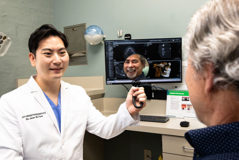 Smiling patient after dental care at J.P Prosthodontics in Fullerton, CA