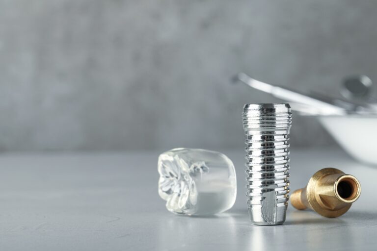 Custom dental implant crown shown with implant components in Fullerton CA